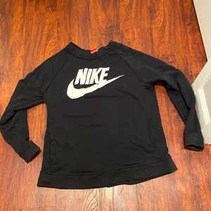 Nike women’s medium sweatshirt. Black with white Nike on front.